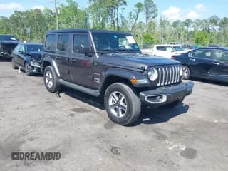 ✅ 2022 Jeep Wrangler Unlimited Sahara • VIN: 1C4HJXEN2NW194502 • Lot: 42002455. Listed on IAAI with 34,861 mi. Free auction sales archive from the USA and detailed vehicle history report at DreamBid. Image 1.