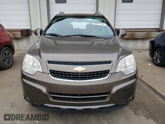 2014 Chevrolet Captiva Sport LT с VIN 3GNAL3EK5ES517941, выставлен на аукционе Copart как лот 82647754 с пробегом 142 020 миль миль и Списание • Salvage title. История ставок и продаж доступна на DreamBid. Изображение 5.