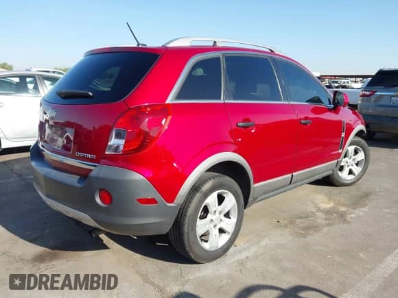 2015 Chevrolet Captiva Sport LS z VIN 3GNAL2EK1FS525367, wystawiony jako IAAI lot #42499277 z przebiegiem 151 208 mil mil oraz . Historia ofert i sprzedaży dostępna na DreamBid. Obrazek 4.