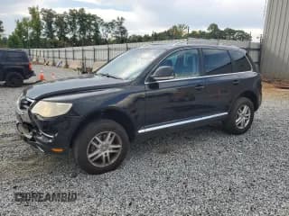 ✅ 2010 Volkswagen Touareg VR6 • VIN: WVGBF7A93AD001758 • Lot: 66564055. Wystawiony na Copart z przebiegiem 187 337 mil. Bezpłatny archiwum sprzedaży aukcyjnych z USA i szczegółowy raport historii pojazdu na DreamBid. Zdjęcie 1.