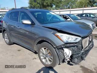 2016 Hyundai Santa Fe z VIN 5XYZUDLA1GG313280, wystawiony jako IAAI lot #43119583 z przebiegiem 78 203 mil mil oraz . Historia ofert i sprzedaży dostępna na DreamBid. Obrazek 1.