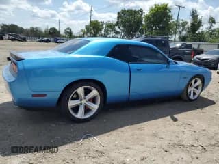 ✅ 2010 Dodge Challenger SRT-8 • VIN: 2B3CJ7DW2AH131799 • Lot: 67161674. Wystawiony na Copart z przebiegiem 92 623 mil. Bezpłatny archiwum sprzedaży aukcyjnych z USA i szczegółowy raport historii pojazdu na DreamBid. Zdjęcie 3.
