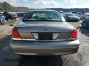 ✅ 2000 Ford Crown Victoria • VIN: 2FAFP73W0YX173874 • Lot: 82113564. Wystawiony na Copart z przebiegiem 108 425 mil. Bezpłatny archiwum sprzedaży aukcyjnych z USA i szczegółowy raport historii pojazdu na DreamBid. Zdjęcie 6.