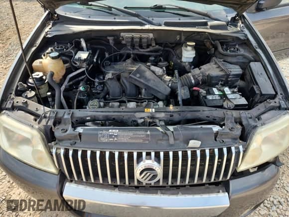 2005 Mercury Mariner Luxury z VIN 4M2YU56145DJ30667, wystawiony jako Copart lot #80196845 z przebiegiem 336 063 mil mil oraz Szkoda całkowita • Salvage title. Historia ofert i sprzedaży dostępna na DreamBid. Obrazek 12.