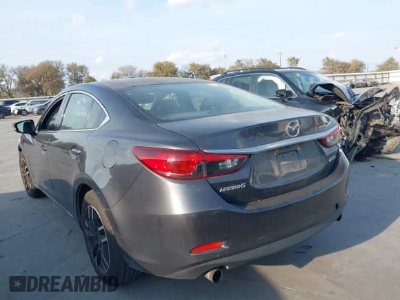 ✅ 2014 Mazda 6 i Touring • VIN: JM1GJ1V60E1117027 • Lot: 43745938. Listed on IAAI with 186,549 mi. Free auction sales archive from the USA and detailed vehicle history report at DreamBid. Image 3.
