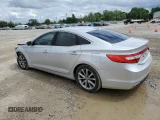 ✅ 2015 Hyundai Azera • VIN: KMHFG4JG9FA469367 • Лот: 61413525. Опубликован ранее на Copart с пробегом 136 608 миль. Бесплатный доступ к архиву аукционных продаж из США и подробный отчёт об истории автомобиля на DreamBid. Изображение 2.