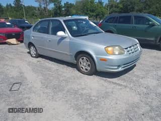 2004 Hyundai Accent GL with VIN KMHCG45C34U499258, listed as a IAAI auction lot 43220179 with 164,871 mi miles and . Bid and sale history available at DreamBid. Image 1.