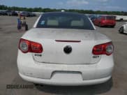 ✅ 2010 Volkswagen Eos Komfort • VIN: WVWBA7AH7AV016302 • Лот: 67805265. Опубликован ранее на Copart с пробегом 47 624 миль. Бесплатный доступ к архиву аукционных продаж из США и подробный отчёт об истории автомобиля на DreamBid. Изображение 6.