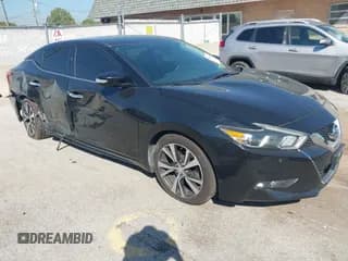✅ 2017 Nissan Maxima Platinum • VIN: 1N4AA6AP6HC401584 • Lot: 43244633. Listed on IAAI with 101,577 mi. Free auction sales archive from the USA and detailed vehicle history report at DreamBid. Image 1.
