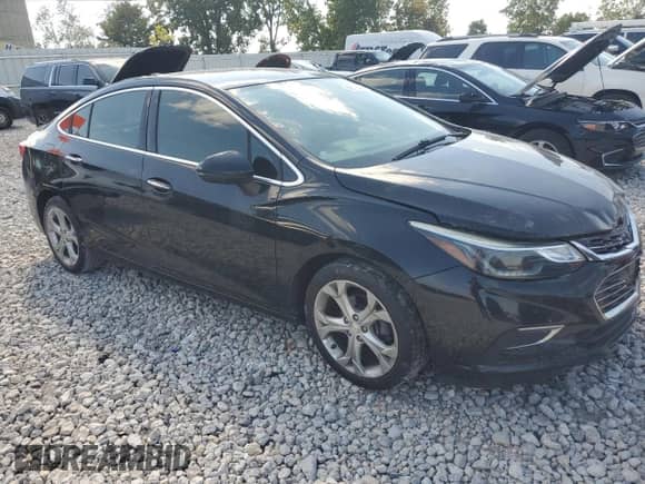 2017 Chevrolet Cruze Premier with VIN 1G1BF5SM7H7230988, listed as a Copart auction lot 80516445 with 85,493 mi miles and Clean title. Bid and sale history available at DreamBid. Image 4.