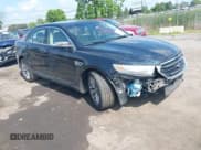 ✅ 2014 Ford Taurus Limited • VIN: 1FAHP2F85EG125118 • Lot: 42457437. Listed on IAAI with 129,406 mi. Free auction sales archive from the USA and detailed vehicle history report at DreamBid. Image 1.