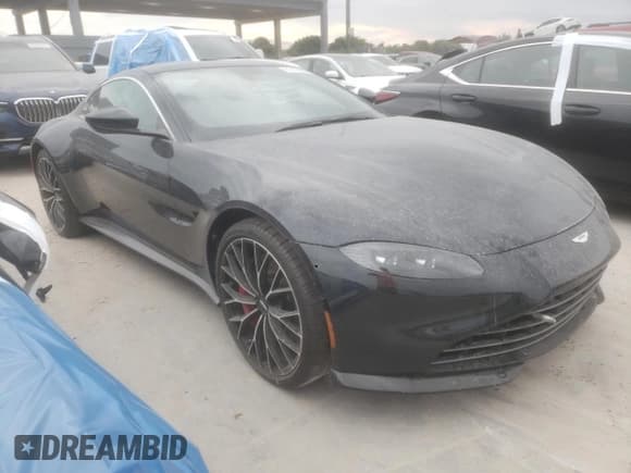✅ 2022 Aston Martin Vantage • VIN: SCFSMGAW9NGN06578 • Lot: 91475955. Wystawiony na Copart z przebiegiem Nie podano. Bezpłatny archiwum sprzedaży aukcyjnych z USA i szczegółowy raport historii pojazdu na DreamBid. Zdjęcie 4.