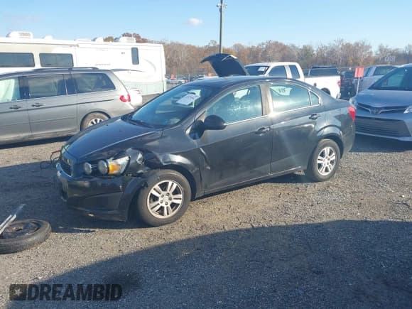 ✅ 2014 Chevrolet Sonic LT • VIN: 1G1JC5SH0E4228312 • Lot: 43579562. Listed on IAAI with 136,210 mi. Free auction sales archive from the USA and detailed vehicle history report at DreamBid. Image 2.