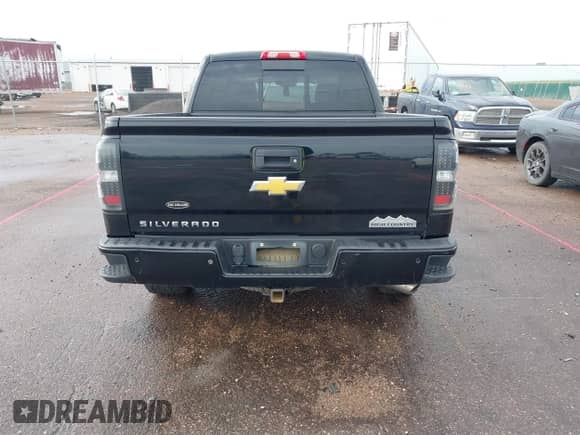 2014 Chevrolet Silverado 1500 High Country with VIN 3GCUKTEC2EG553252, listed as a IAAI auction lot 42898703 with 193,749 mi miles and . Bid and sale history available at DreamBid. Image 16.