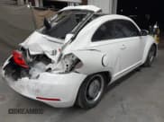 ✅ 2013 Volkswagen Beetle Fender Edition • VIN: 3VWJP7AT3DM615918 • Lot: 42346141. Listed on IAAI with Not provided. Free auction sales archive from the USA and detailed vehicle history report at DreamBid. Image 4.