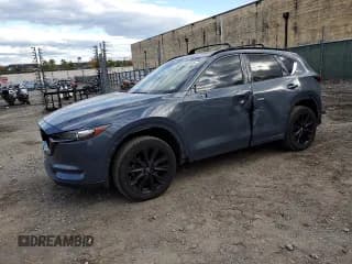✅ 2021 Mazda CX-5 Carbon Edition • VIN: JM3KFACY9M0392147 • Lot: 89485265. Listed on Copart with 81,253 mi. Free auction sales archive from the USA and detailed vehicle history report at DreamBid. Image 1.