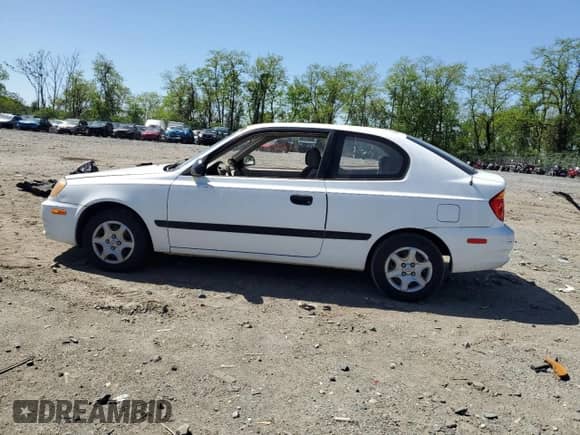 2003 Hyundai Accent с VIN KMHCF35C53U240220, выставлен на аукционе Copart как лот 52581415 с пробегом 102 322 миль миль и Списание • Salvage title. История ставок и продаж доступна на DreamBid. Изображение 2.