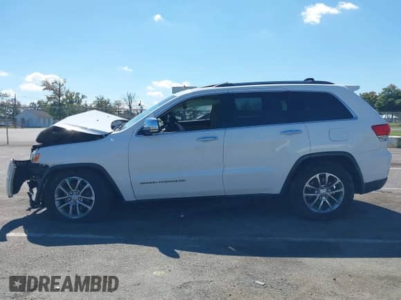2016 Jeep Grand Cherokee Limited with VIN 1C4RJFBG1GC335021, listed as a IAAI auction lot 43250632 with 115,217 mi miles and . Bid and sale history available at DreamBid. Image 14.