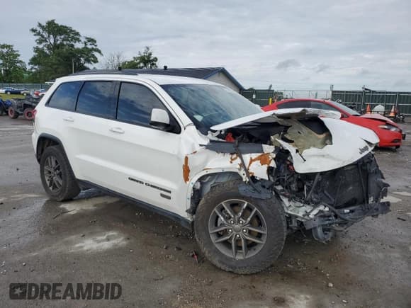 ✅ 2017 Jeep Grand Cherokee 75th Anniversary • VIN: 1C4RJEAG3HC696232 • Lot: 57362055. Listed on Copart with 105,440 mi. Free auction sales archive from the USA and detailed vehicle history report at DreamBid. Image 4.