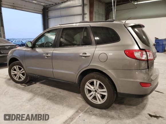 ✅ 2011 Hyundai Santa Fe SE • VIN: 5XYZHDAG4BG005119 • Lot: 85141464. Listed on Copart with 186,384 mi. Free auction sales archive from the USA and detailed vehicle history report at DreamBid. Image 2.