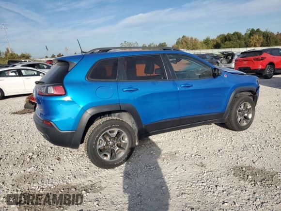 ✅ 2019 Jeep Cherokee Trailhawk Elite • VIN: 1C4PJMBX4KD352779 • Lot: 85080285. Listed on Copart with 56,985 mi. Free auction sales archive from the USA and detailed vehicle history report at DreamBid. Image 3.