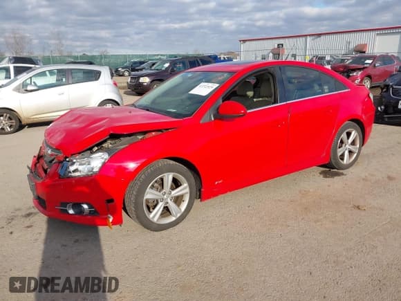 ✅ 2014 Chevrolet Cruze 2LT • VIN: 1G1PE5SB4E7454044 • Lot: 43722929. Listed on IAAI with 110,817 mi. Free auction sales archive from the USA and detailed vehicle history report at DreamBid. Image 2.