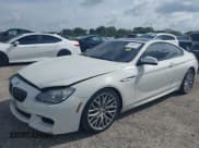 ✅ 2013 BMW 6 Series 650i xDrive • VIN: WBAYM1C58DDZ02668 • Lot: 41986512. Wystawiony na IAAI z przebiegiem 77 302 mil. Bezpłatny archiwum sprzedaży aukcyjnych z USA i szczegółowy raport historii pojazdu na DreamBid. Zdjęcie 2.