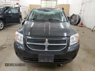 ✅ 2009 Dodge Caliber SXT • VIN: 1B3HB48A79D148493 • Лот: 77770094. Опубликован ранее на Copart с пробегом 92 344 миль. Бесплатный доступ к архиву аукционных продаж из США и подробный отчёт об истории автомобиля на DreamBid. Изображение 5.