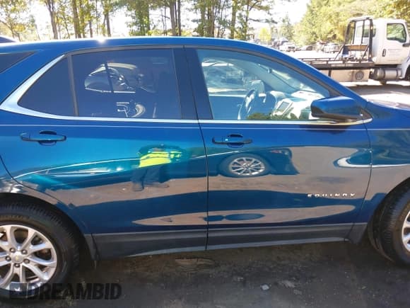 ✅ 2020 Chevrolet Equinox LT • VIN: 2GNAXJEV5L6153020 • Lot: 43486682. Listed on IAAI with 66,378 mi. Free auction sales archive from the USA and detailed vehicle history report at DreamBid. Image 14.