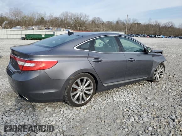 ✅ 2013 Hyundai Azera • VIN: KMHFH4JG4DA317104 • Лот: 52909875. Опубликован ранее на Copart с пробегом 125 485 миль. Бесплатный доступ к архиву аукционных продаж из США и подробный отчёт об истории автомобиля на DreamBid. Изображение 3.