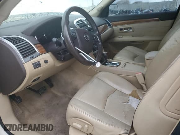 ✅ 2008 Cadillac SRX • VIN: 1GYEE63A280100878 • Lot: 43991375. Listed on Copart with 157,092 mi. Free auction sales archive from the USA and detailed vehicle history report at DreamBid. Image 7.