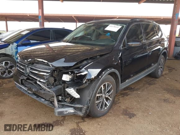 ✅ 2018 Volkswagen Tiguan SEL • VIN: 3VV3B7AX1JM036551 • Лот: 42170151. Опубликован ранее на IAAI с пробегом 97 506 миль. Бесплатный доступ к архиву аукционных продаж из США и подробный отчёт об истории автомобиля на DreamBid. Изображение 17.