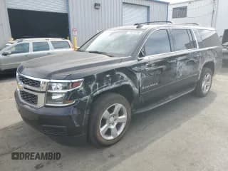 ✅ 2019 Chevrolet Suburban LS • VIN: 1GNSCGKC2KR297407 • Lot: 75224194. Listed on Copart with 93,562 mi. Free auction sales archive from the USA and detailed vehicle history report at DreamBid. Image 1.