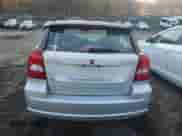 2011 Dodge Caliber Mainstreet with VIN 1B3CB3HA3BD123701, listed as a Copart auction lot 90858485 with 172,631 mi miles and Salvage title. Bid and sale history available at DreamBid. Image 6.