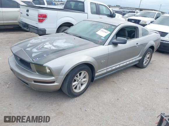 ✅ 2009 Ford Mustang • VIN: 1ZVHT80N095145945 • Lot: 42832887. Listed on IAAI with 200,215 mi. Free auction sales archive from the USA and detailed vehicle history report at DreamBid. Image 2.
