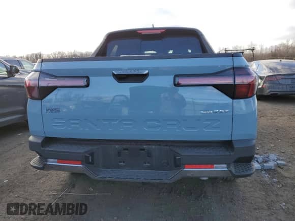 2024 Hyundai Santa Cruz Limited z VIN 5NTJEDAF7RH100548, wystawiony jako Copart lot #88242865 z przebiegiem 4 696 mil mil oraz Szkoda całkowita • Salvage title. Historia ofert i sprzedaży dostępna na DreamBid. Obrazek 6.