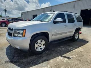 2014 Chevrolet Tahoe LT z VIN 1GNSCBE07ER135040, wystawiony jako Copart lot #65328115 z przebiegiem 114 497 mil mil oraz Szkoda całkowita • Salvage title. Historia ofert i sprzedaży dostępna na DreamBid. Obrazek 1.