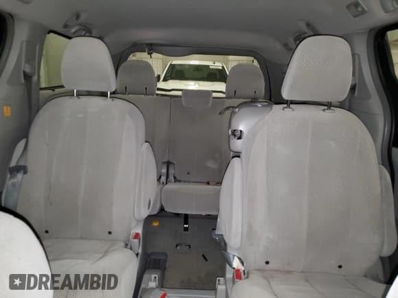 ✅ 2012 Toyota Sienna LE AAS • VIN: 5TDKK3DC1CS265097 • Lot: 86068265. Listed on Copart with 142,841 mi. Free auction sales archive from the USA and detailed vehicle history report at DreamBid. Image 10.