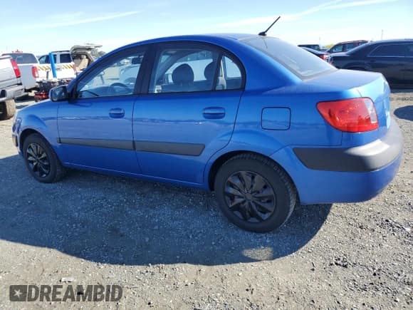 ✅ 2008 Kia Rio LX • VIN: KNADE123086431671 • Lot: 82518655. Listed on Copart with 123,281 mi. Free auction sales archive from the USA and detailed vehicle history report at DreamBid. Image 2.