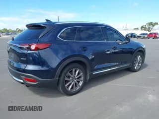 ✅ 2021 Mazda CX-9 Carbon Edition • VIN: JM3TCBDY4M0536270 • Lot: 43560036. Wystawiony na IAAI z przebiegiem 172 665 mil. Bezpłatny archiwum sprzedaży aukcyjnych z USA i szczegółowy raport historii pojazdu na DreamBid. Zdjęcie 4.