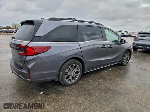 ✅ 2025 Honda Odyssey Touring • VIN: 5FNRL6H83SB011705 • Lot: 94996825. Listed on Copart with 20,690 mi. Free auction sales archive from the USA and detailed vehicle history report at DreamBid. Image 3.