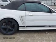 ✅ 2004 Ford Mustang Deluxe • VIN: 1FAFP44694F208401 • Lot: 43871483. Listed on IAAI with 133,344 mi. Free auction sales archive from the USA and detailed vehicle history report at DreamBid. Image 6.