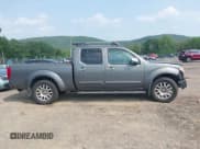 ✅ 2009 Nissan Frontier SE • VIN: 1N6AD09W19C407379 • Lot: 42494543. Listed on IAAI with 209,680 mi. Free auction sales archive from the USA and detailed vehicle history report at DreamBid. Image 13.