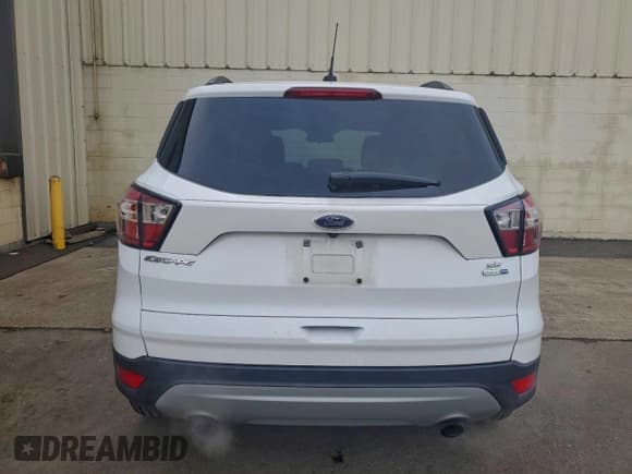 ✅ 2018 Ford Escape SE • VIN: 1FMCU9GD9JUD38307 • Лот: 93866345. Опубликован ранее на Copart с пробегом 66 289 миль. Бесплатный доступ к архиву аукционных продаж из США и подробный отчёт об истории автомобиля на DreamBid. Изображение 6.