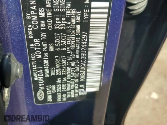 2011 Hyundai Tucson Limited with VIN KM8JUCAC3BU244297, listed as a Copart auction lot 48629585 with 208,270 mi miles and Salvage title. Bid and sale history available at DreamBid. Image 13.