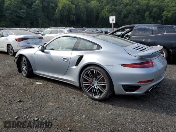 ✅ 2015 Porsche 911 Turbo S • VIN: WP0AD2A97FS166370 • Lot: 68497274. Listed on Copart with 3,015 mi. Free auction sales archive from the USA and detailed vehicle history report at DreamBid. Image 2.