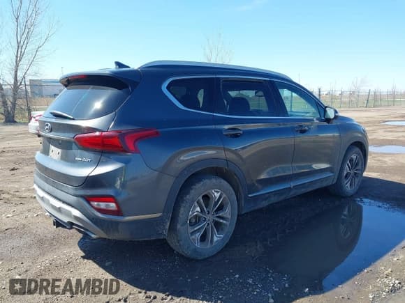 ✅ 2020 Hyundai Santa Fe Limited • VIN: 5NMS5CAA0LH208063 • Лот: 42131296. Опубликован ранее на IAAI с пробегом 65 030 миль. Бесплатный доступ к архиву аукционных продаж из США и подробный отчёт об истории автомобиля на DreamBid. Изображение 4.