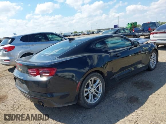 ✅ 2021 Chevrolet Camaro 1LS • VIN: 1G1FB1RX9M0142128 • Lot: 43441768. Listed on IAAI with 57,722 mi. Free auction sales archive from the USA and detailed vehicle history report at DreamBid. Image 4.