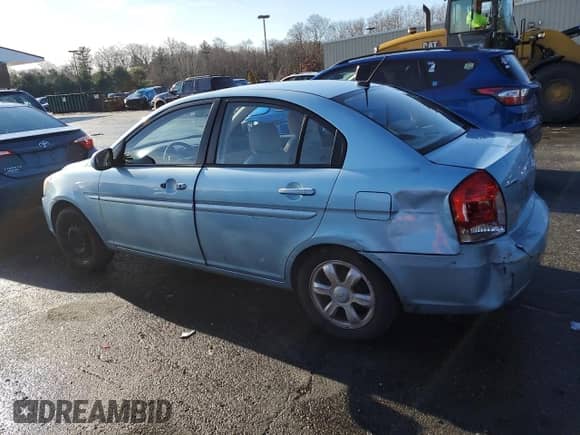 2010 Hyundai Accent GLS z VIN KMHCN4AC5AU469525, wystawiony jako Copart lot #84854934 z przebiegiem 237 334 mil mil oraz Szkoda całkowita • Salvage title. Historia ofert i sprzedaży dostępna na DreamBid. Obrazek 3.
