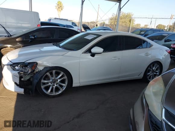 ✅ 2015 Mazda 6 i Touring • VIN: JM1GJ1V5XF1180550 • Lot: 43218155. Wystawiony na IAAI z przebiegiem 124 975 mil. Bezpłatny archiwum sprzedaży aukcyjnych z USA i szczegółowy raport historii pojazdu na DreamBid. Zdjęcie 14.